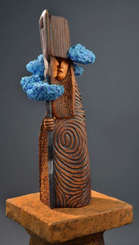 Clayton Thiel_Stone_Sculptures Truth Sayer Shaman in spiral cape and blue clouds