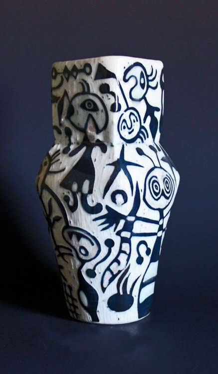 Jim Mulfinger, 2010 - Miro inspired black slip sgrafitto over porcelain with clear glaze thrown and altered vase