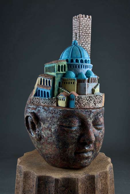 clayton_thiel_bigHeads_Memory Sculpture of a head with arched buildings on top