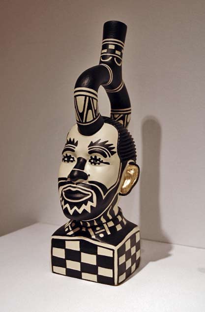 Diego-Romero-ceramic-head sculpture in black-white and gold