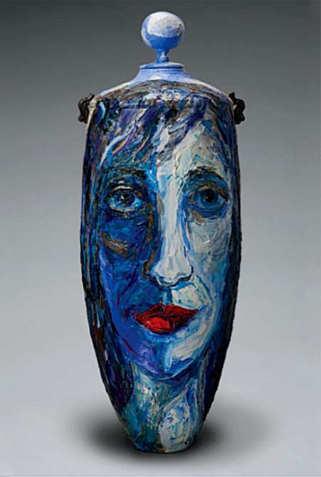 Sue-Averell-and-Joseph-Woodford lidded ceramic vessel with blue face motif