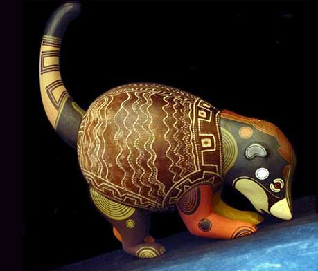 Brunka tribe-This spectacular Coatimundi figure made from balsa wood and the 'jícara' fruit shell. Painting by Paco Lazaro Fernandez and carved by his mother Loli Lazaro Fernandez