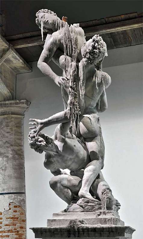 Urs Fischer's facsimile of Giovanni Giambologna’s 'The rape of the sabine women', executed in candle wax with wicks, at Venice art Biennale, 2011.