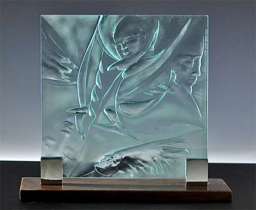 Four Faces---Susan Bloch - carved glass sculpture