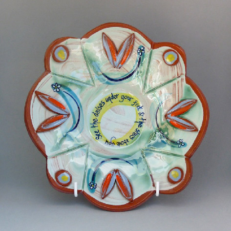 Scallop-dishBeautiful shallow dish with relief work and the words, “See the daisies under your feet and the stars above you