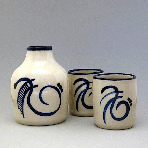 Stoneware Sake set decorated by hand with cobalt oxide