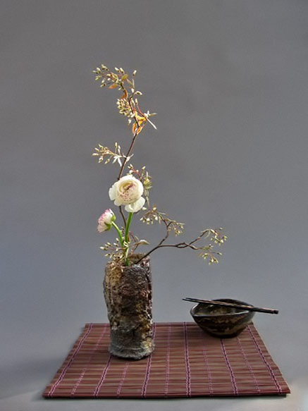 ikebana display by Anita Haase Schönbeck,-Berlin ceramic vessel by Jochen Ruth