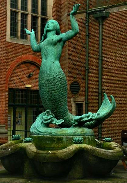 Light green coloured Bronze mermaid fountain, University of Birmingham, England