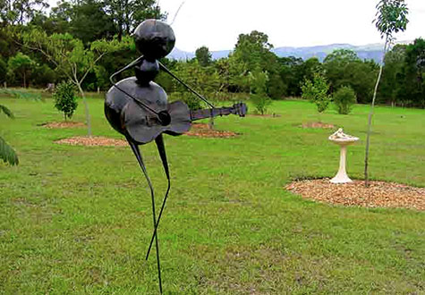 Contemporary guitar player sculpture -- Galeria-Aniela-Sculpture-Park-NSW-Australia