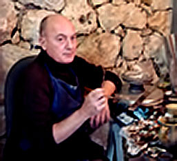portraits-Jacques-Massard ceramic artist at work hand painting 