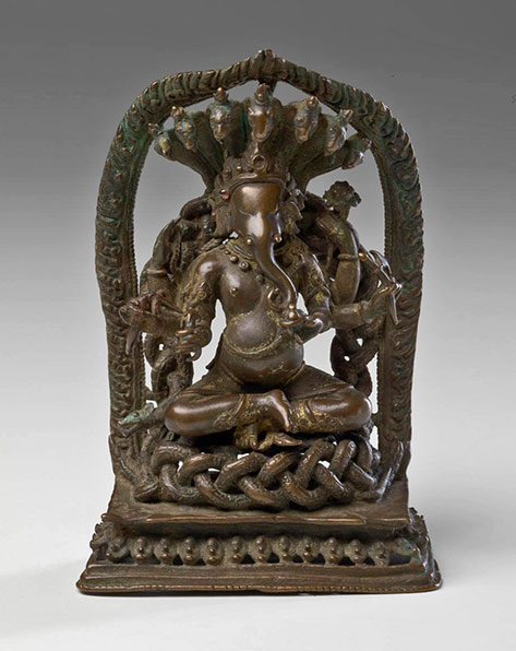 Ganesha on a throne of cobras---Nepal(17th-century) bronze cast statue