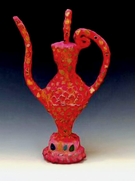 Bright red ceramic teapot by Linda Hoffhine