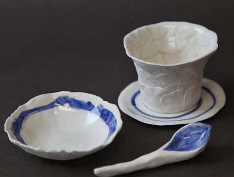 Porcelain cup, saucer,plate and spoon - Sally Cleary