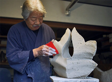 Yasuhisa Kohyama ceramic sculpting in studio