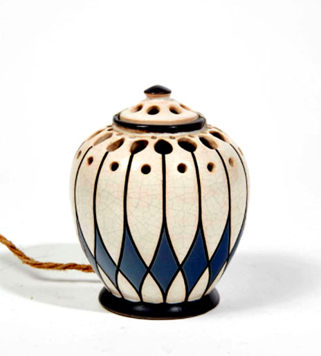 Montières. Pot covered openwork enamelled earthenware polychrome