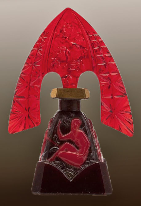 Art deco perfume bottle with red female figure motif