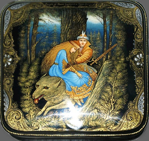 A Palekh jewellery box depicting a scene from the fairy tale Tsarevitch Ivan,-the-Fire Bird and the Gray Wolf