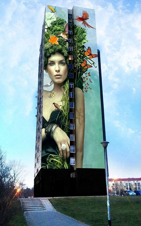 Graffikon-'Natura'-in-Poland Mural on building of a woman with nature hair decoration
