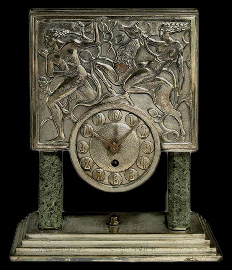 Art Deco mantle clock with silver relief panel