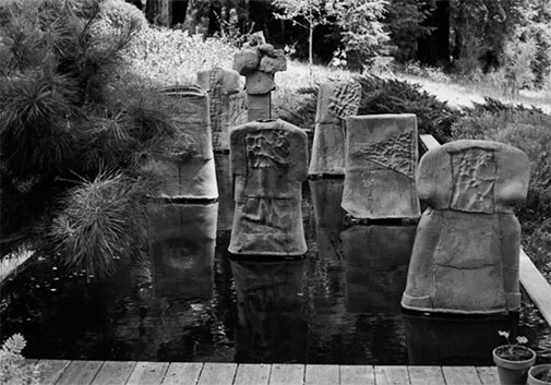 Ceramic sculptures in a pond -- Daniel Rhodes