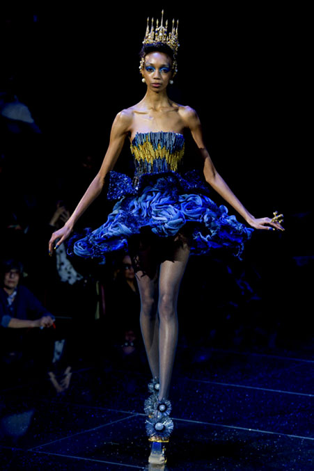 Model in blue and gold dress by Guo Pei
