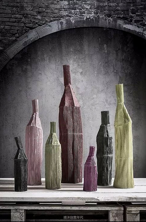 Paola Paronetto ribbed paper clay bottles