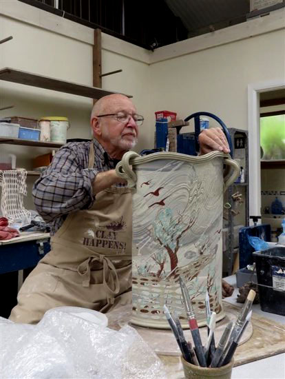 Jim Robidson with his slab built landscap vase 2015