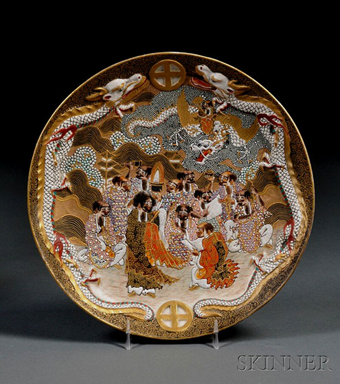 Satsuma Plate, Japan, 20th century, round, with three dragons in low relief surrounding arhat
