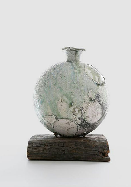 Yui Tsujimura - globular bottle vase on wood base