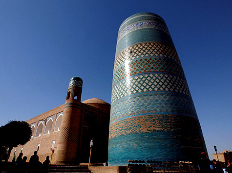 Kalta Mino minaret, a squat turquoise tiled structure-Khiva