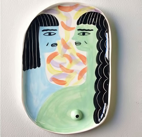 Ceramic artistLaura Bird-depicts-long-haired-ladies-running-along-the-sides-of-her-painted-ceramics.