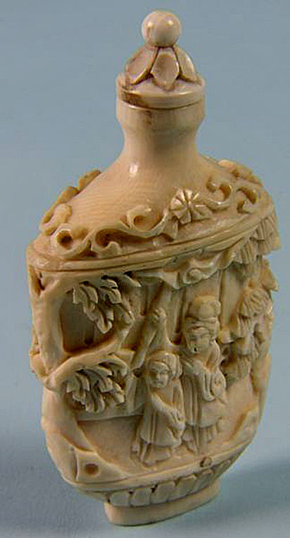 Carved snuff bottle with relief figures