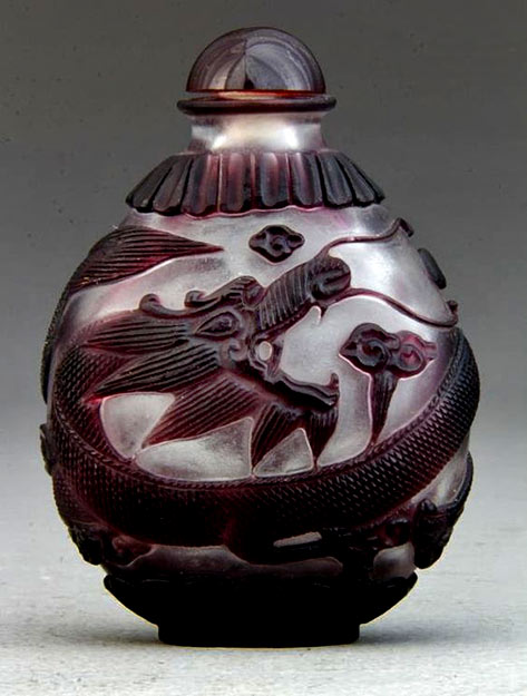 Chinese Peking Glass Snuff Bottle--Having overlay depicting dragon with body that wraps around vessel,