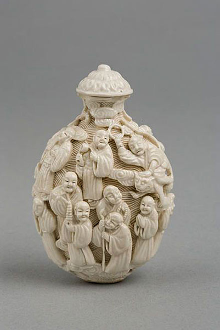 Chinese snuff bottle, Qing Dynasty; 1796-1850; white porcelain with moulded decoration. V & A