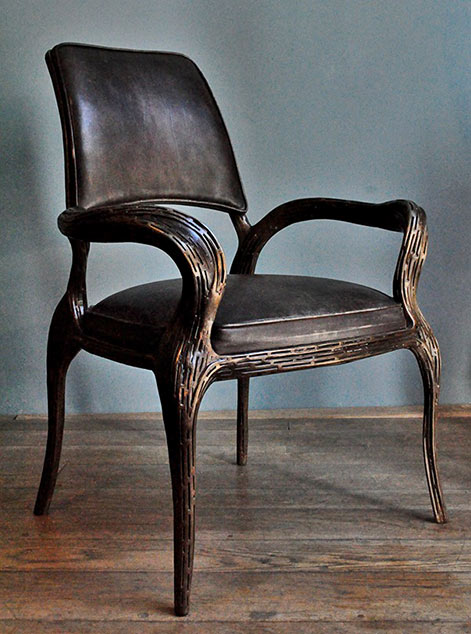 Chair by Wunderkammer Studio -- leather with metal frame
