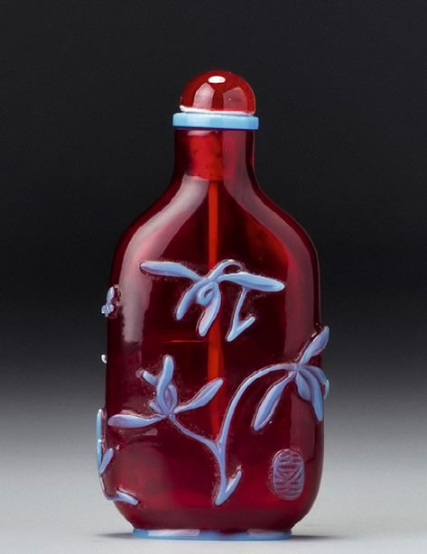 Turquoise-blue overlay ruby-red glass 'flowering orchids' snuff bottle--Yangzhou, Qing dynasty, 19th century