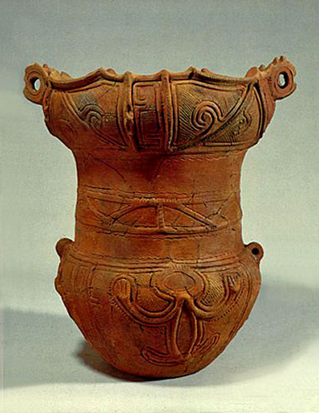 The retainer of the pot has a human motif. BC.3,500 - BC.2,500. Jomon era. Yamanashi Japan.