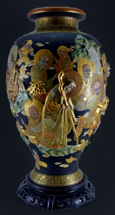 Japanese Meiji Period satsuma porcelain vase with multiple characters in high relief
