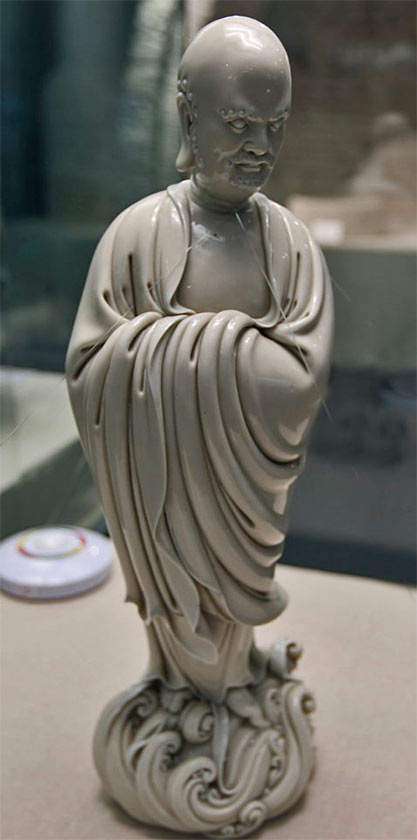 Zen Buddhist monk figurine porcelain