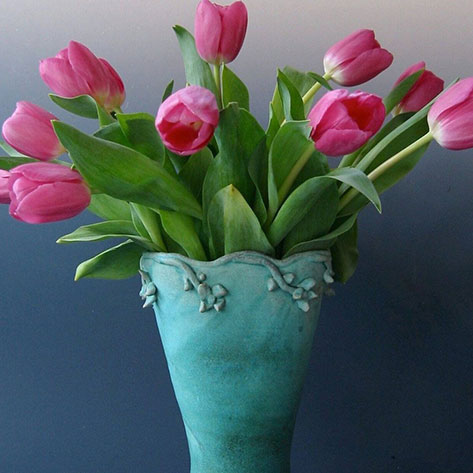Charlene Murphy turquoise vase and pink tulips
