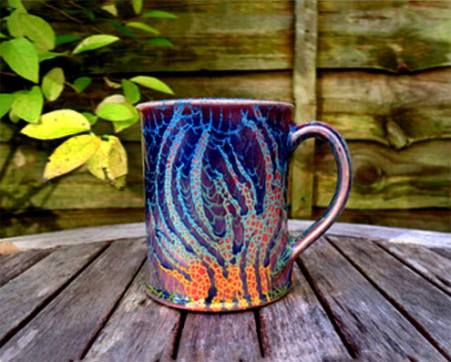 Ceramic blue flames mug--Rupert Andrews