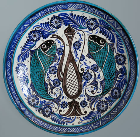 Plate with twin fish motif -- Rustam Usmanov, Rishtan, Uzbekistan