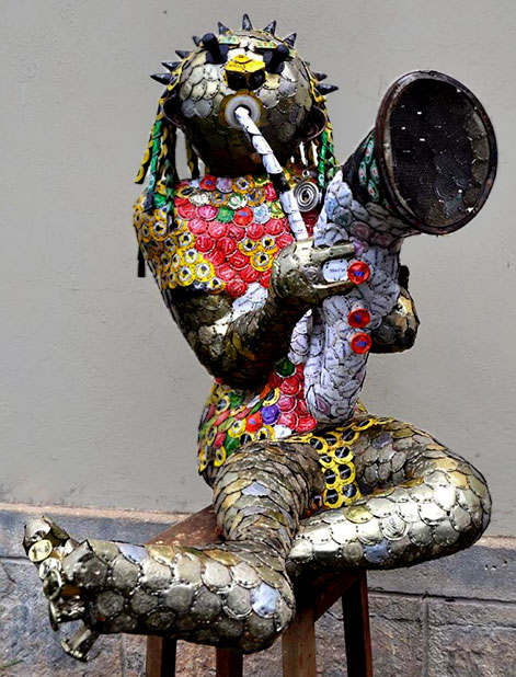 Bottletop figure sculpture by Cyrus Kabiru
