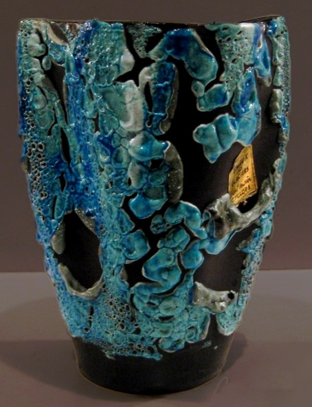 Cyclope Pottery Annecy Emaux des GlaciersVase with pinched sides from the Cyclope Pottery, Annecy, France. Glazed in a thick turquoise, white and grey drip on a matt black ground.