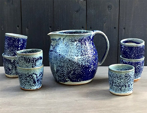 Speckled blue and white jug and cups Quemada Ceramica