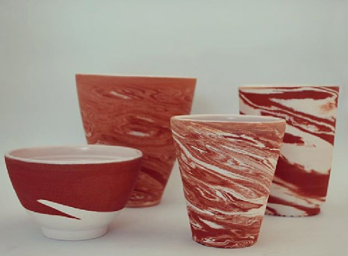 Red and white drinking cups - Quemada 