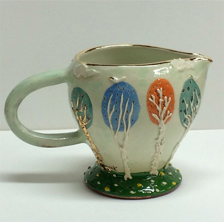 Stacey-Manser-Knight--Underglaze and-over-piping with glaze and lustre tree jug