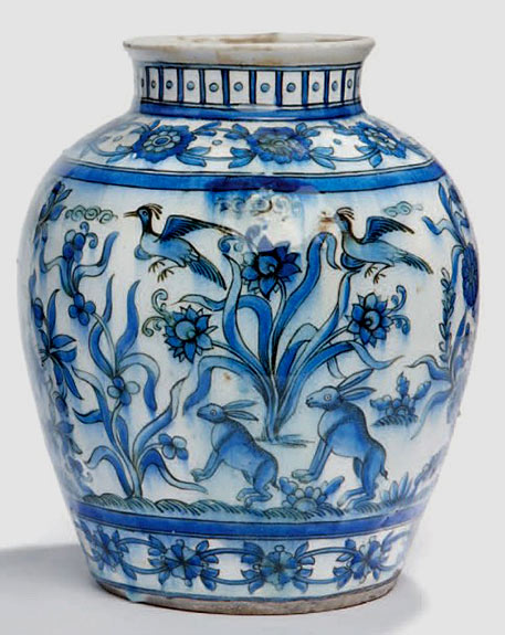 CERAMIC-VASE-OF-THE-QAJAR-ERA-with-blue,-greenish-and-black-decor-on-a-white-background-of-birds,-caprids,-rabbits-and-bouquets-of-hearts
