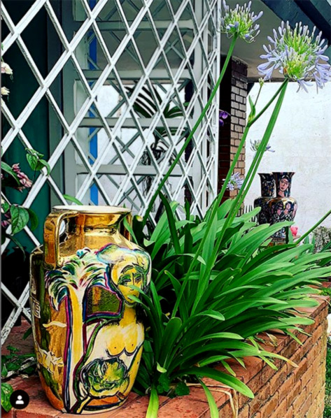 Isabella Tuchband vases in garden