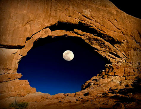 the-moon-through-north-window-arches-national-park-utah-united-states
